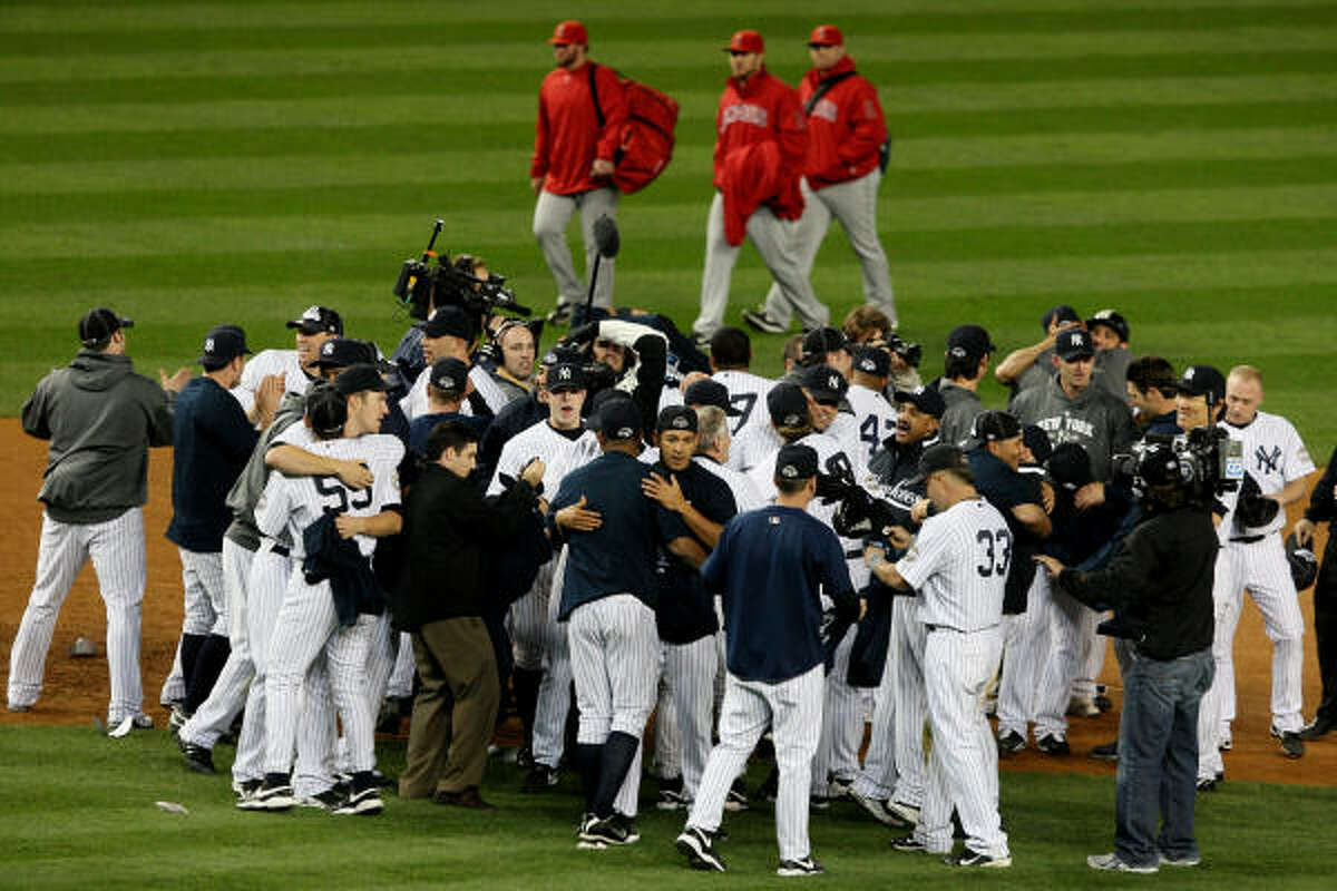 Game 6: Yankees 5, Angels 2 The New York Yankees celebrate their win over the Los Angeles Angels in Game 6 of the ALCS on Sunday night at Yankee Stadium in New York. The Yankees won the ALCS, 4-2, and will advance to the World Series to face the Philadelphia Phillies.