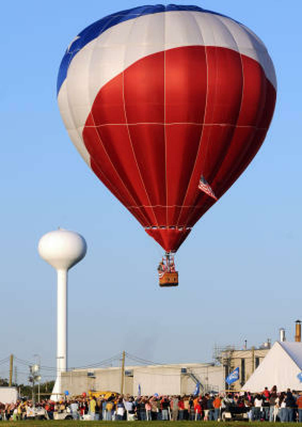 Hot air balloons take off over Johnson Space Center.