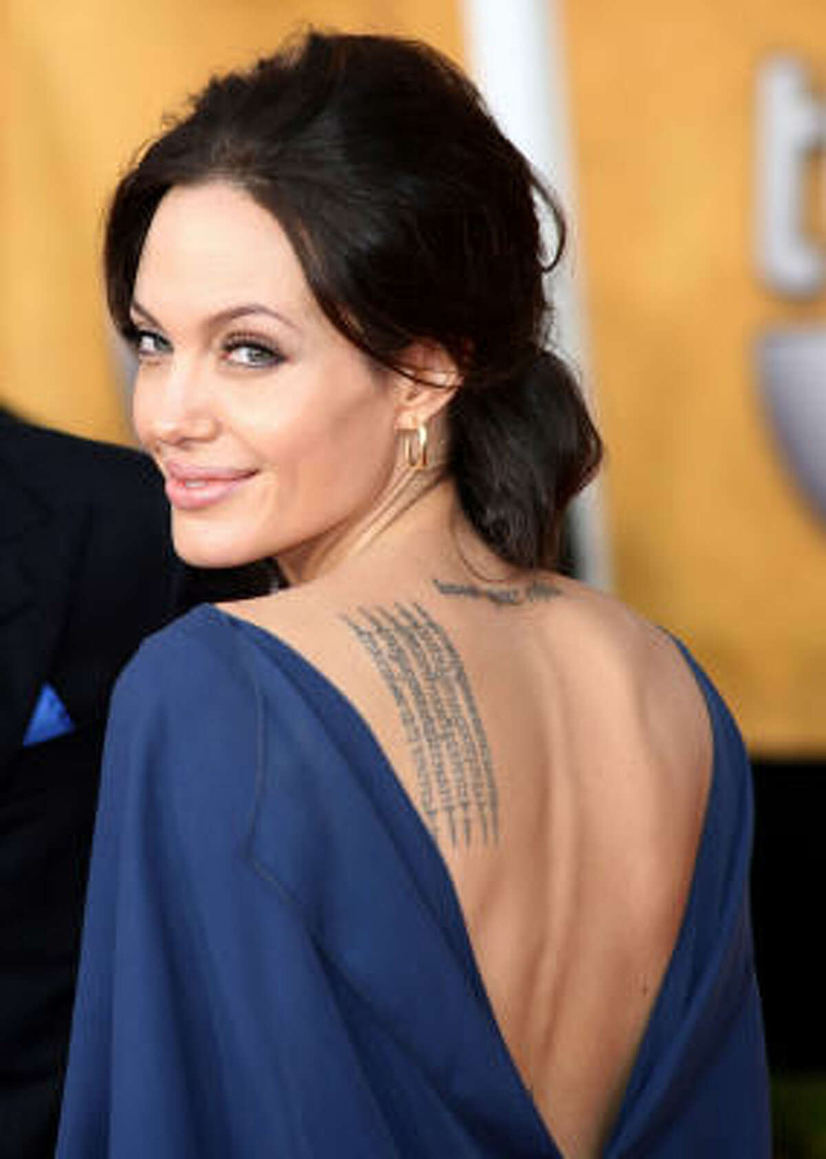 Angelina Jolie. Because we think her attempts to create her own rainbow tribe are sheer narcissism.