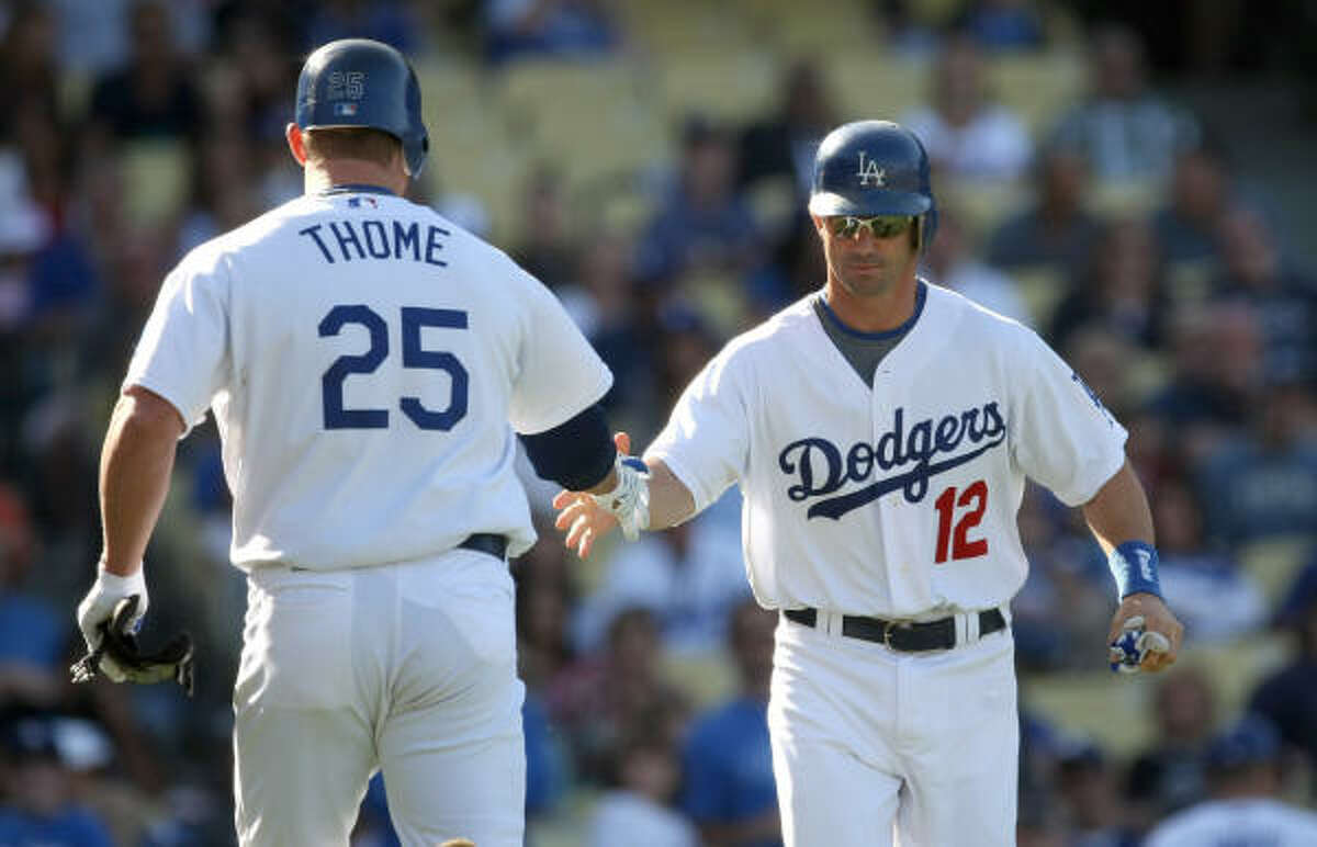 Brad Ausmus, Dodgers Then: The Astros' all-time leader in games caught in two stints (1997-98 and 2001-08) Now: Thriving offensively, by his standards, in very limited playing time, hitting .295 with a .712 OPS in 36 games.