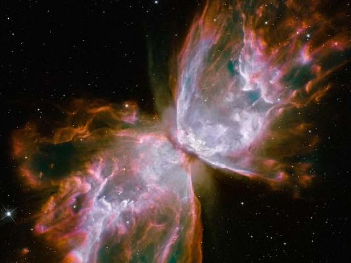 Butterfly Emerges from Stellar Demise in Planetary Nebula NGC 6302 - What resemble dainty butterfly wings are actually roiling cauldrons of gas heated to more than 36,000 degrees Fahrenheit. The gas is tearing across space at more than 600,000 miles an hour -- fast enough to travel from Earth to the moon in 24 minutes. Read more about these images here.