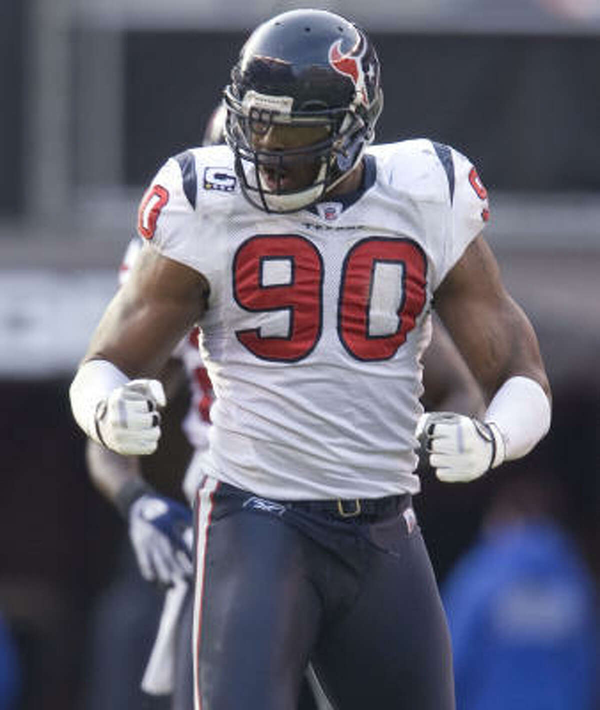 Texans defender Mario Williams celebrates after a tackle against the Cleveland Browns during the third quarter.