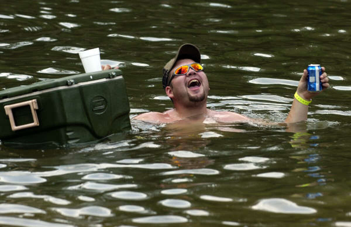 Matt Millen floats his cooler of beer down river during the 13th Annual Summer Redneck Games July 11, 2009 in East Dublin, Georgia.
