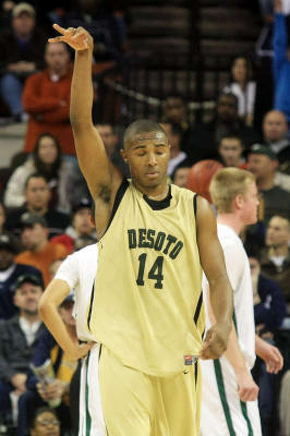 DeSoto's Darius Terrell gestures after making his final free throw and the game's final point.