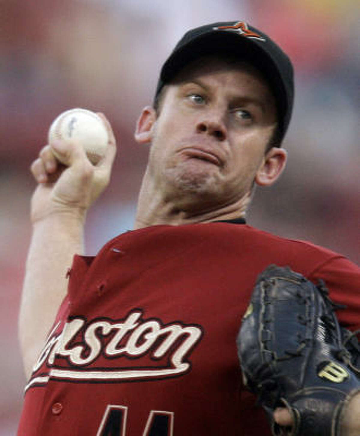 Astros starter Roy Oswalt pitches against the Reds in the first inning at Great American Ball Park in Cincinnati.