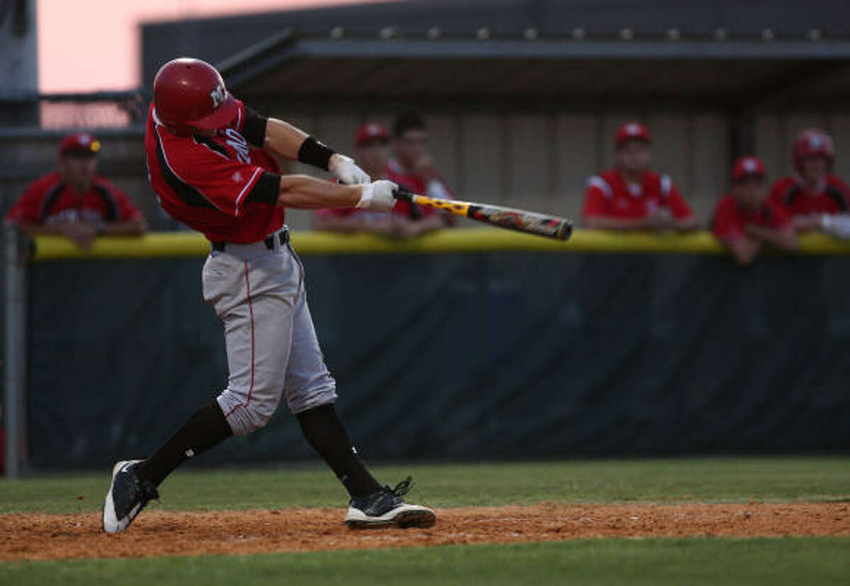 Memorial's Michael Ratterree connects for a two-run homer to put the Mustangs ahead of Cinco Ranch 6-1. Ratterree homered twice in the Mustang's win.