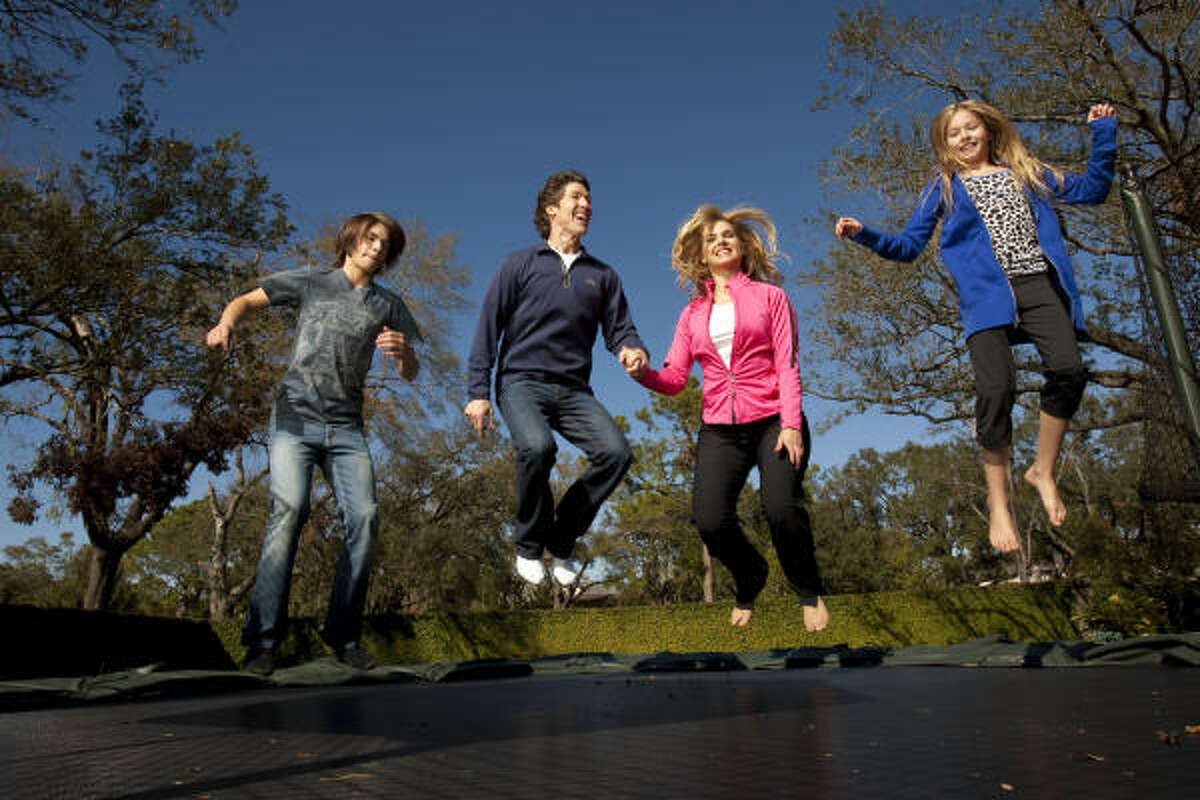 Having grown up in an active family, Lakewood Church’s Victoria Osteen incorporates her husband Joel, and two kids Jonathan, far left, and Alexandra, far right, into her regimen of healthy foods, exercise and maintaining a positive attitude.