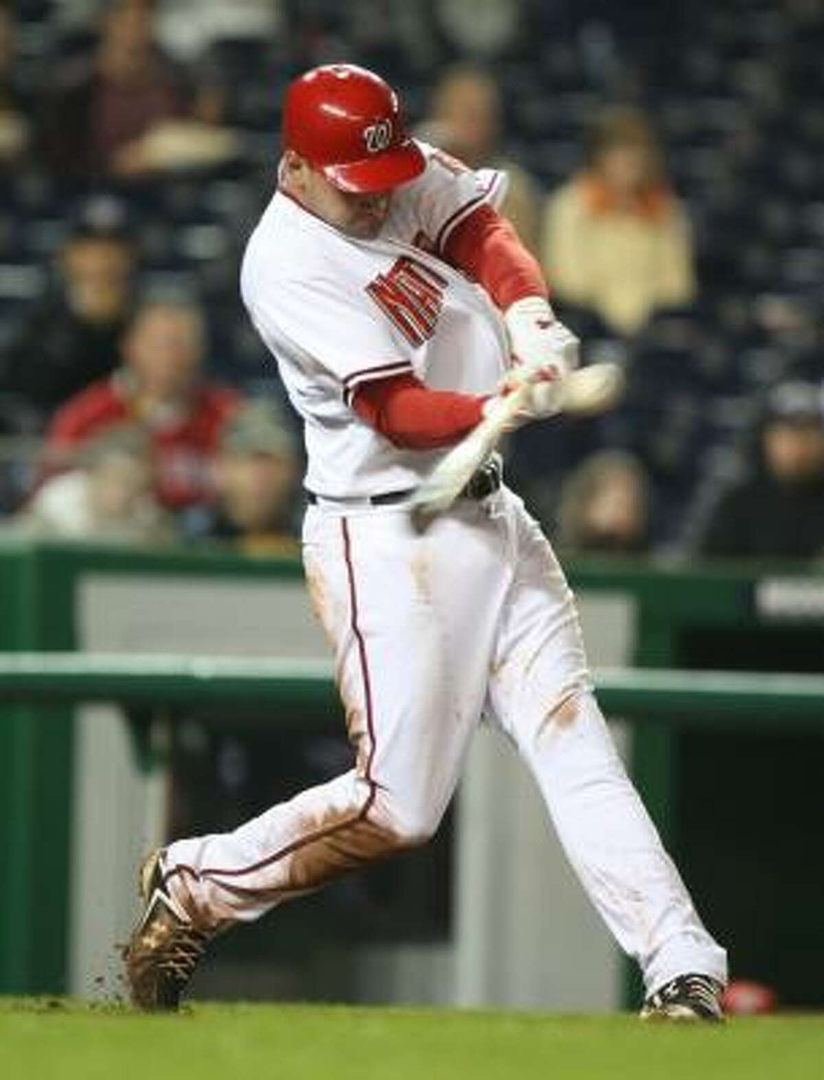 Washington's Ryan Zimmerman hits an RBI double in the seventh inning.