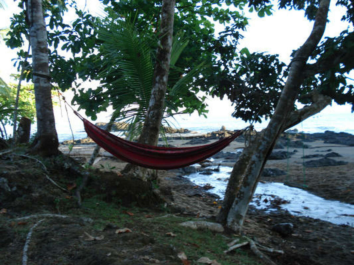 A hammock hangs outside most of the tents at the Corcovado Adventures Tent Camp in Costa Rica. Campers have to make an effort to get to the park.