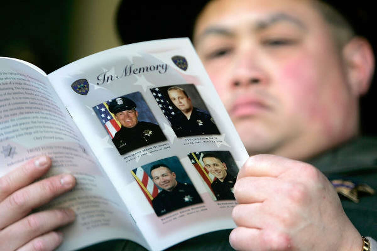 Law enforcement gather to honor four fallen Oakland California police officers in Oakland, California. Thousands of police officers from across the country along with members of the public came out to pay their respects to four Oakland police officers the were killed in the line of duty last Saturday following a traffic stop of a fugitive parolee.