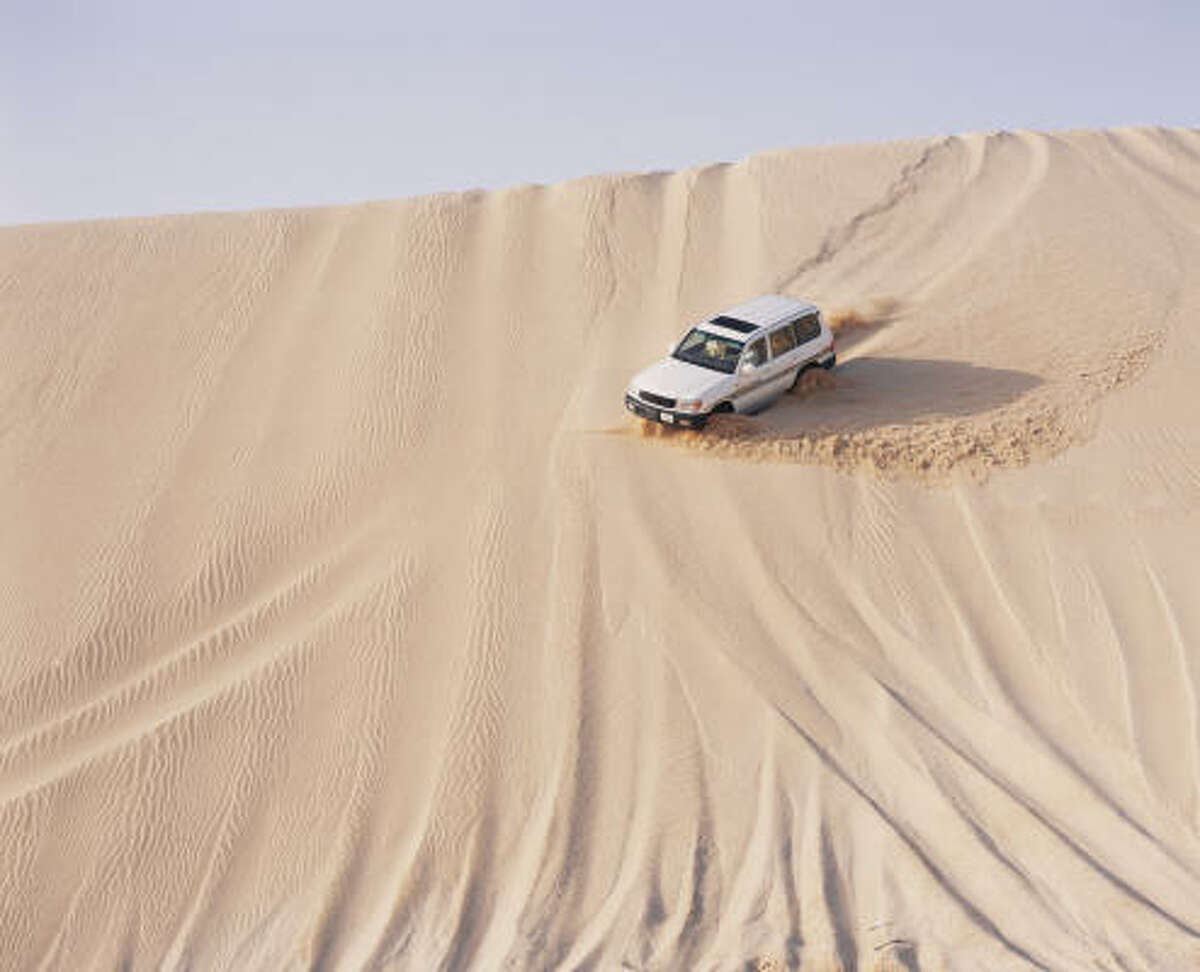 Dune bashing is part of the fun in Qatar. Riders can expect a roller-coasterlike good time traversing the sand dunes.