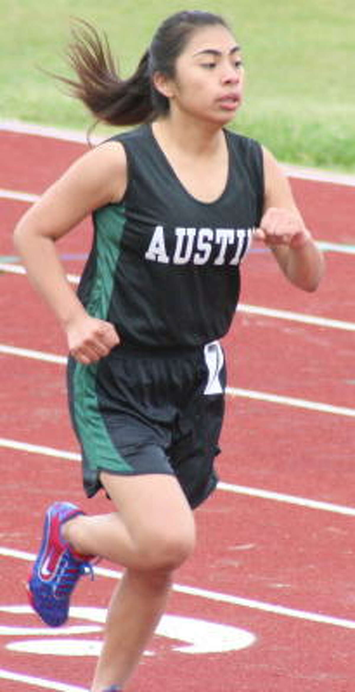 Blanca Garcia of Austin finishes the 400 meters.