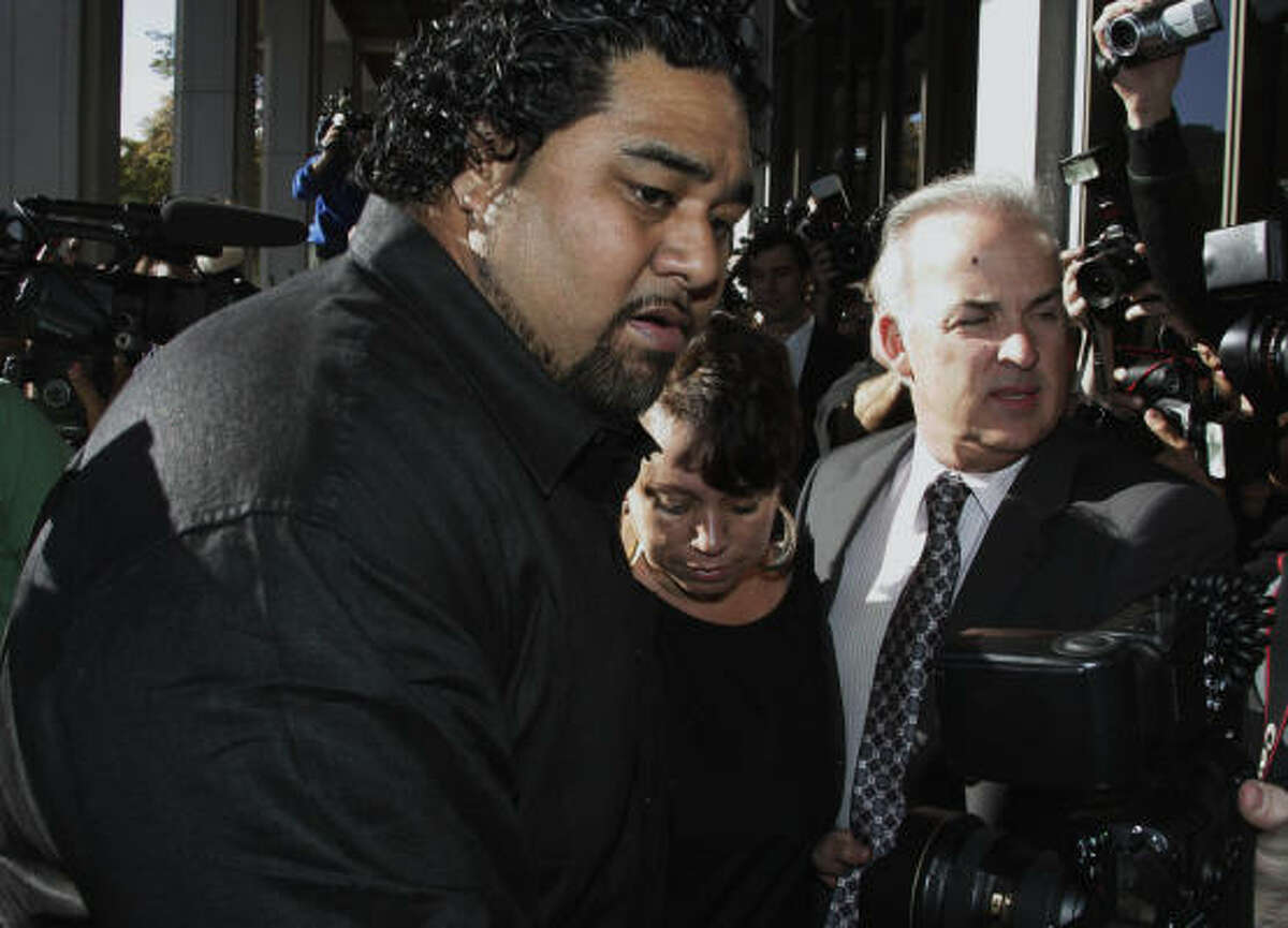 Joyce Brown Hawkins, center, mother of Chris Brown, arrives at his arraignment Thursday in downtown Los Angeles.