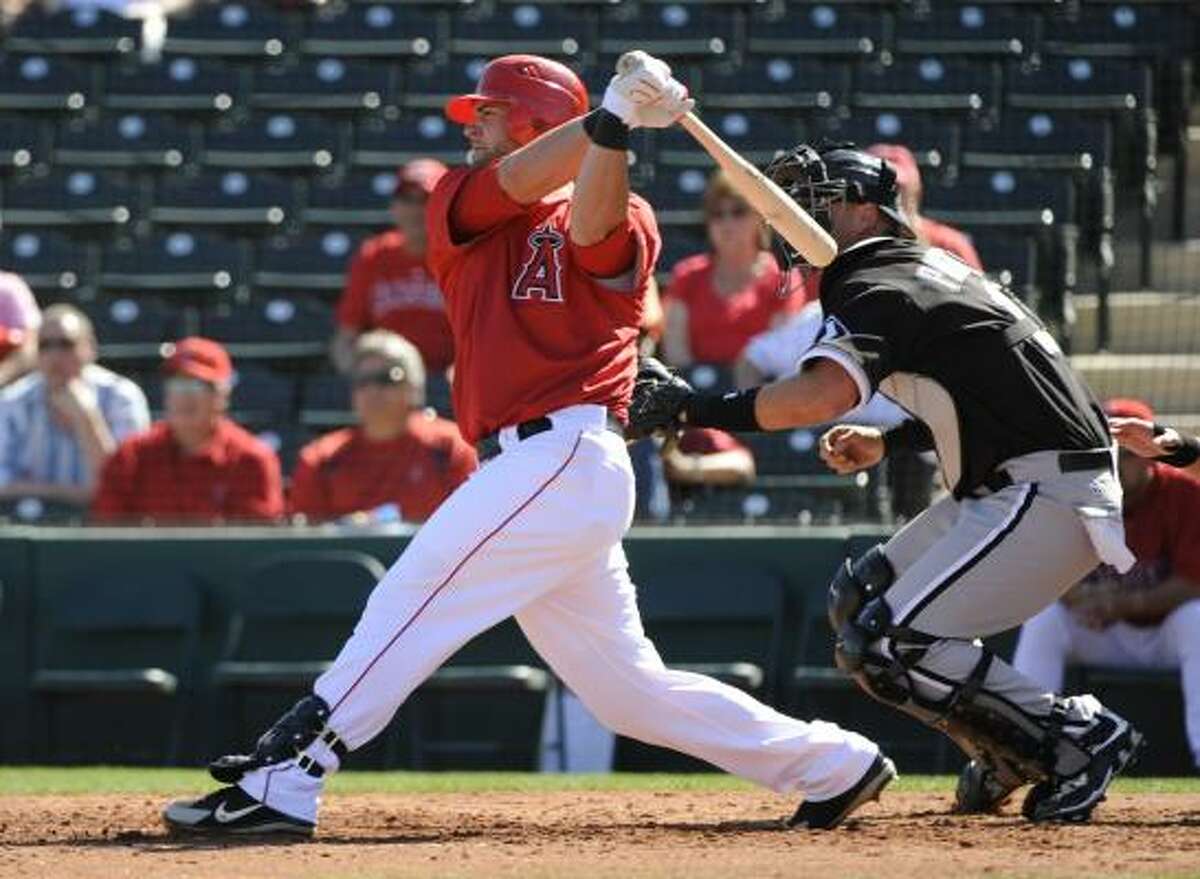 Napoli's two-run double highlighted a three-run third inning and helped the Los Angeles Angels beat the Chicago White Sox 12-3 in the exhibition opener for both teams Wednesday.