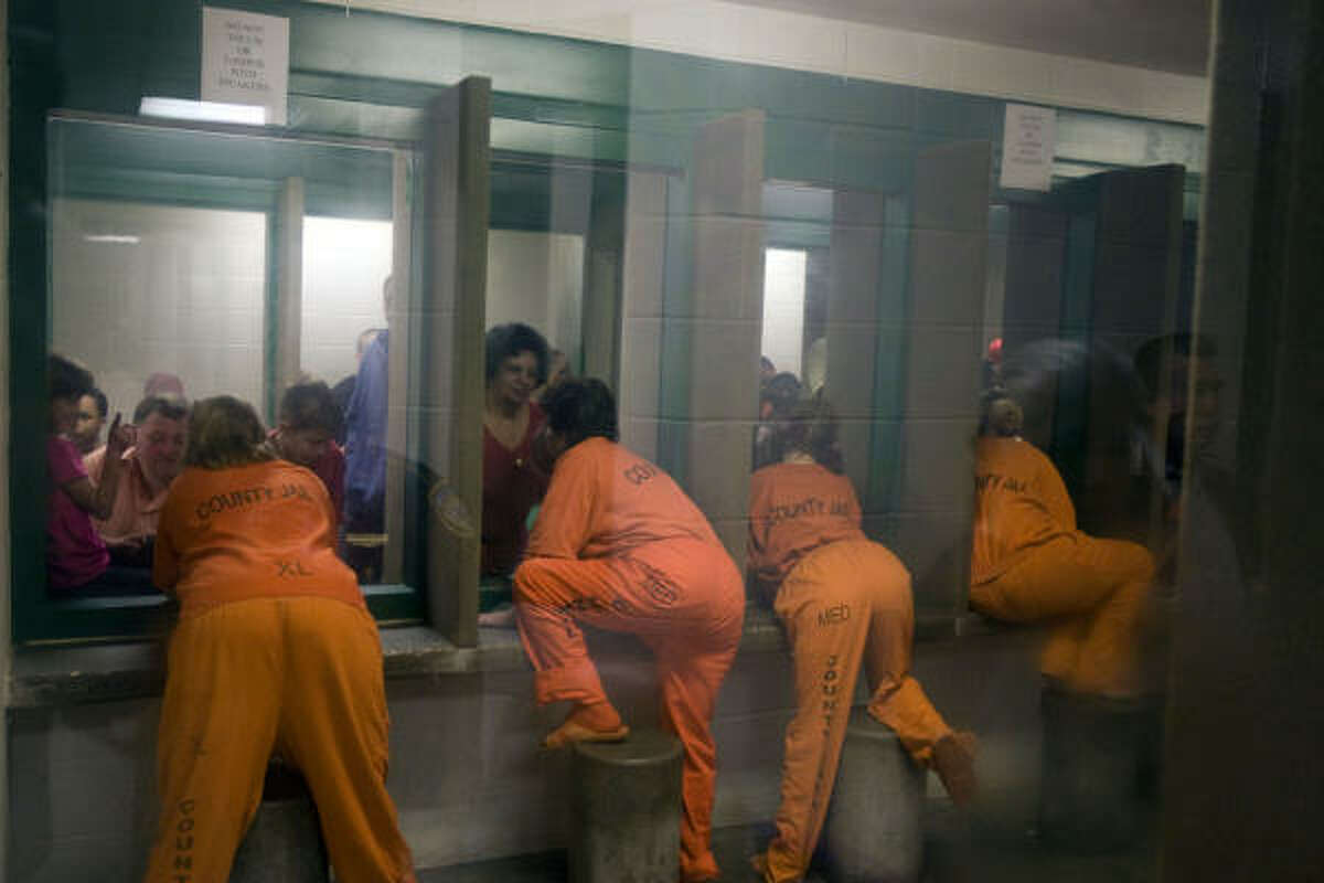 prison visit behind glass