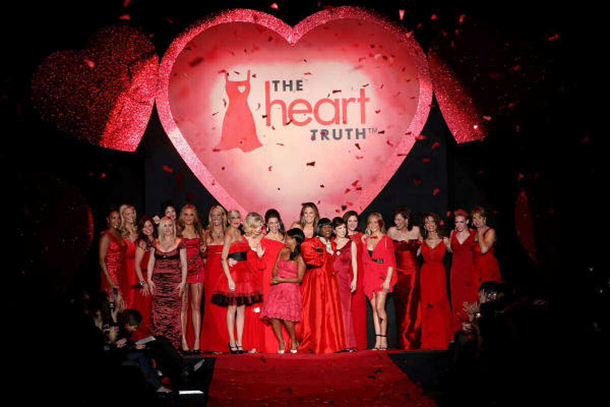 Celebrity runway models stand on the runway at the Heart Truth Red Dress Collection Fall 2009 fashion show during Mercedes-Benz Fashion Week.