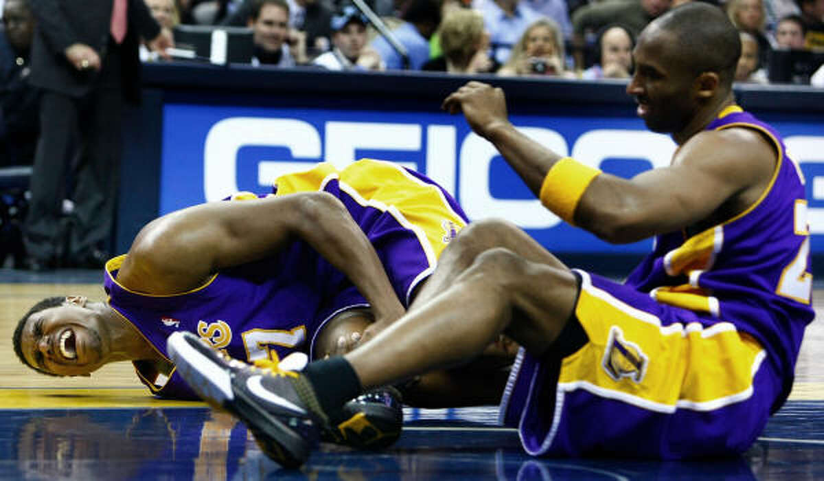 2 - LOS ANGELES LAKERS - (Last wk: 2) - 41-9 - Well, they were good enough to get all the way to the NBA Final's last year without Andrew Bynum (left). But that torn medial collateral ligament in his right knee suddenly brings the Lakers down closer to the rest of the Western Conference pack.