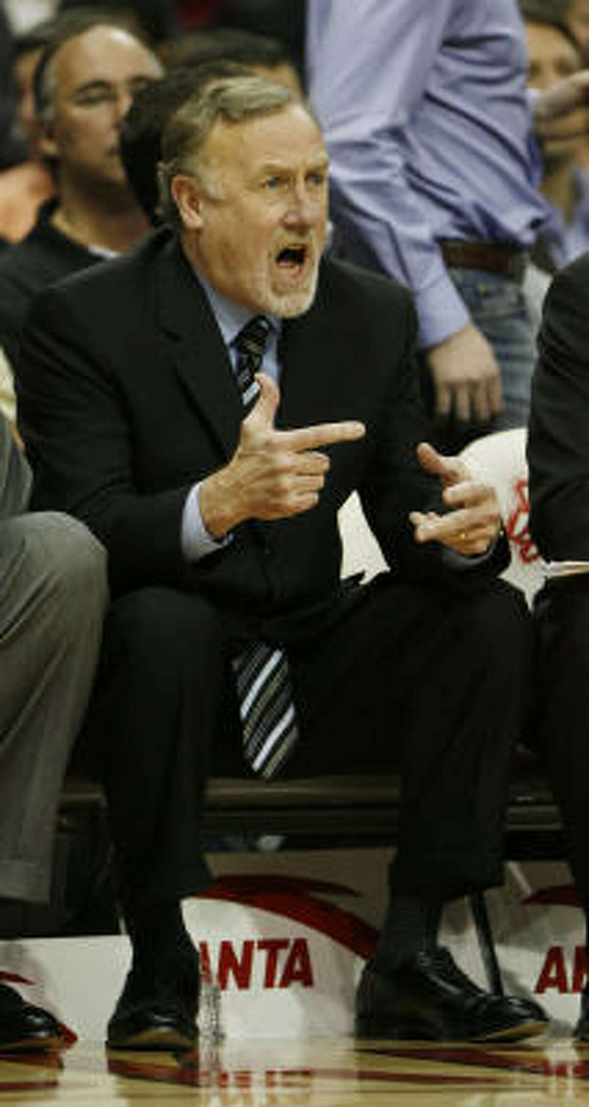 Rockets coach Rick Adelman reacts to a call in the second half.