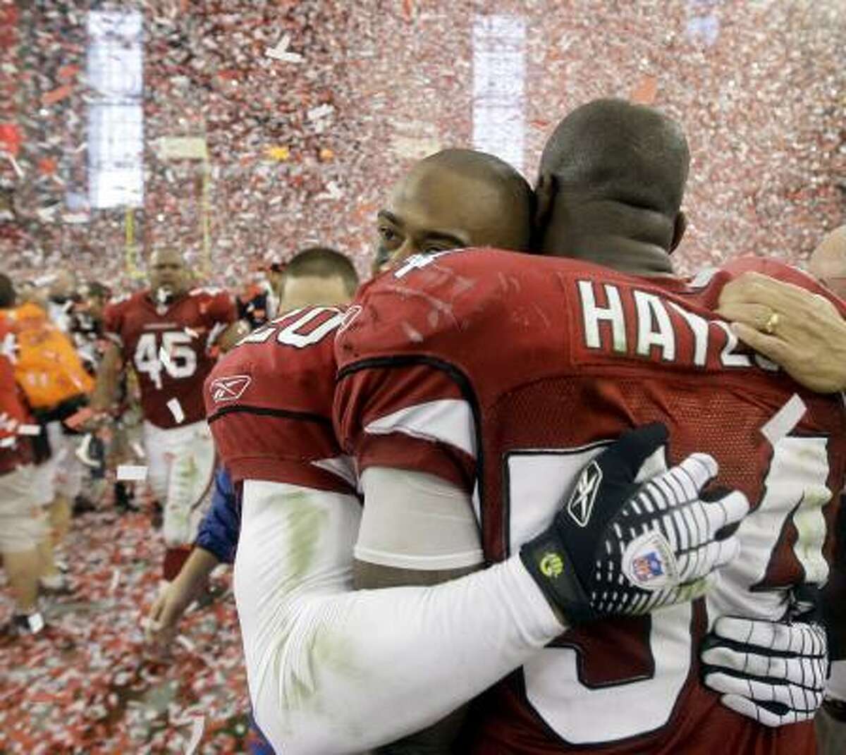 Arizona Cardinals defensive end Calais Campbell holds a towel proclaiming  the team NFC champions after defeating the Philadelphia Eagles in the NFC  Championship game at University of Phoenix Stadium in Glendale, Arizona