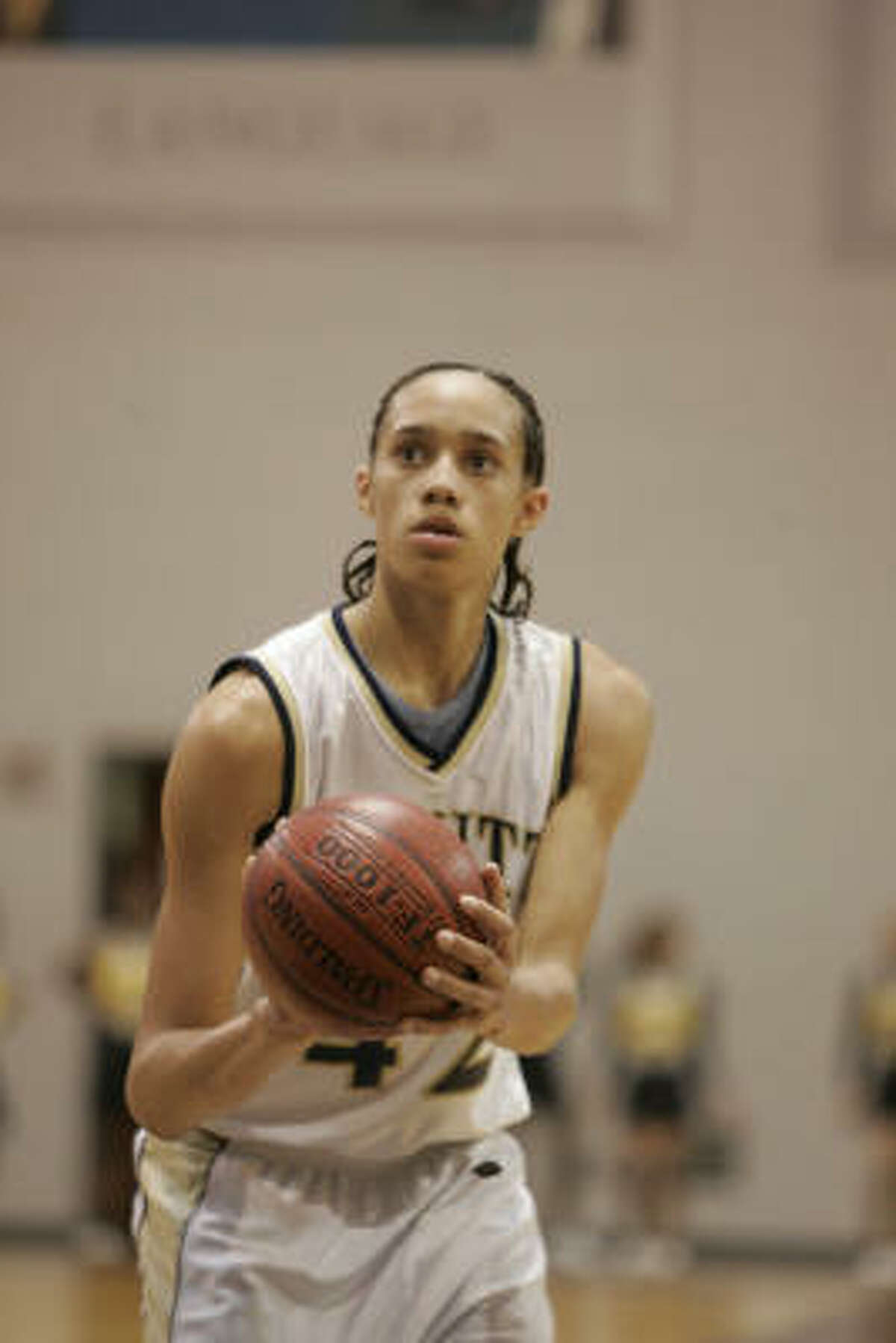 As a sophomore, Brittney Griner led the Nimitz High School Girls Varsity Basketball Team to a 25-5 record, ranking eleventh in the city. In this photo, Griner lines up the second foul shot that put Nimitz in the lead with 33 seconds left in the game to upset the eighth-ranked Eisenhower Girls Varsity Basketball Team (28-5) 42-39.