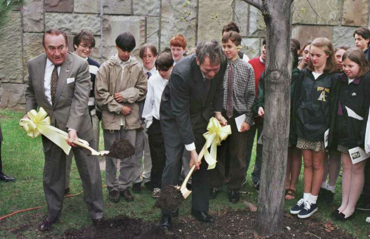 Times Union photo by STEVE JACOBS ,4/24/96, Albany,NY-- NYS Governor Pataki,right, and former NYS Governor Hugh Carey,left, shovel the ground around a tree in the Executive Mansion yard after an Arbor Day tree dedication to Hugh Carey, Wednesday. ( for story) 1 of 2 photos 04/25/96