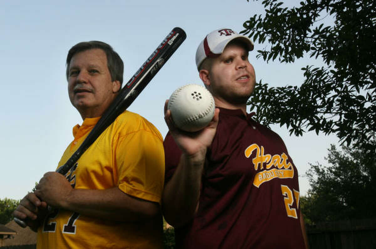 Charles Boudreaux, left, of Deer Park is delighted that his son Blake has found an athletic outlet in Beep Baseball.