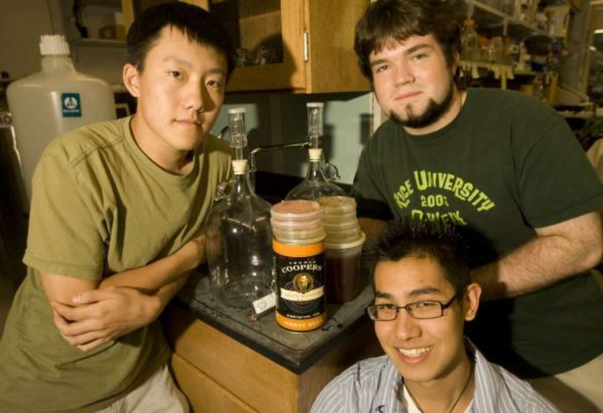 David Ouyang, left, Selim Sheikh, lower center, and Taylor Stevenson display their brewing kit.