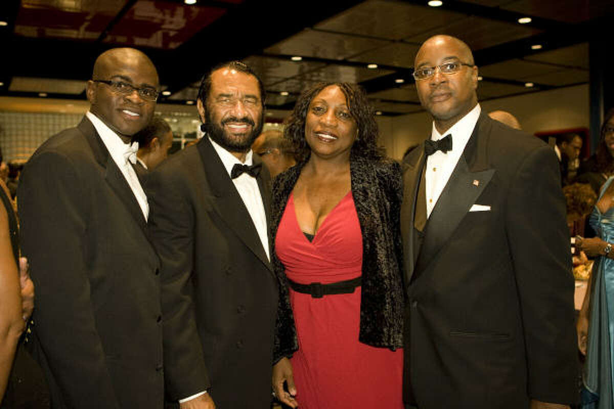 Houston Citizens Chamber of Commerce Pinnacle Awards co-chair Laolu Davies-Yemitan, from left, U.S. Rep. Al Green, gala co-chair Dannette Davis and chamber board chair Carroll Robinson take the spotlight.