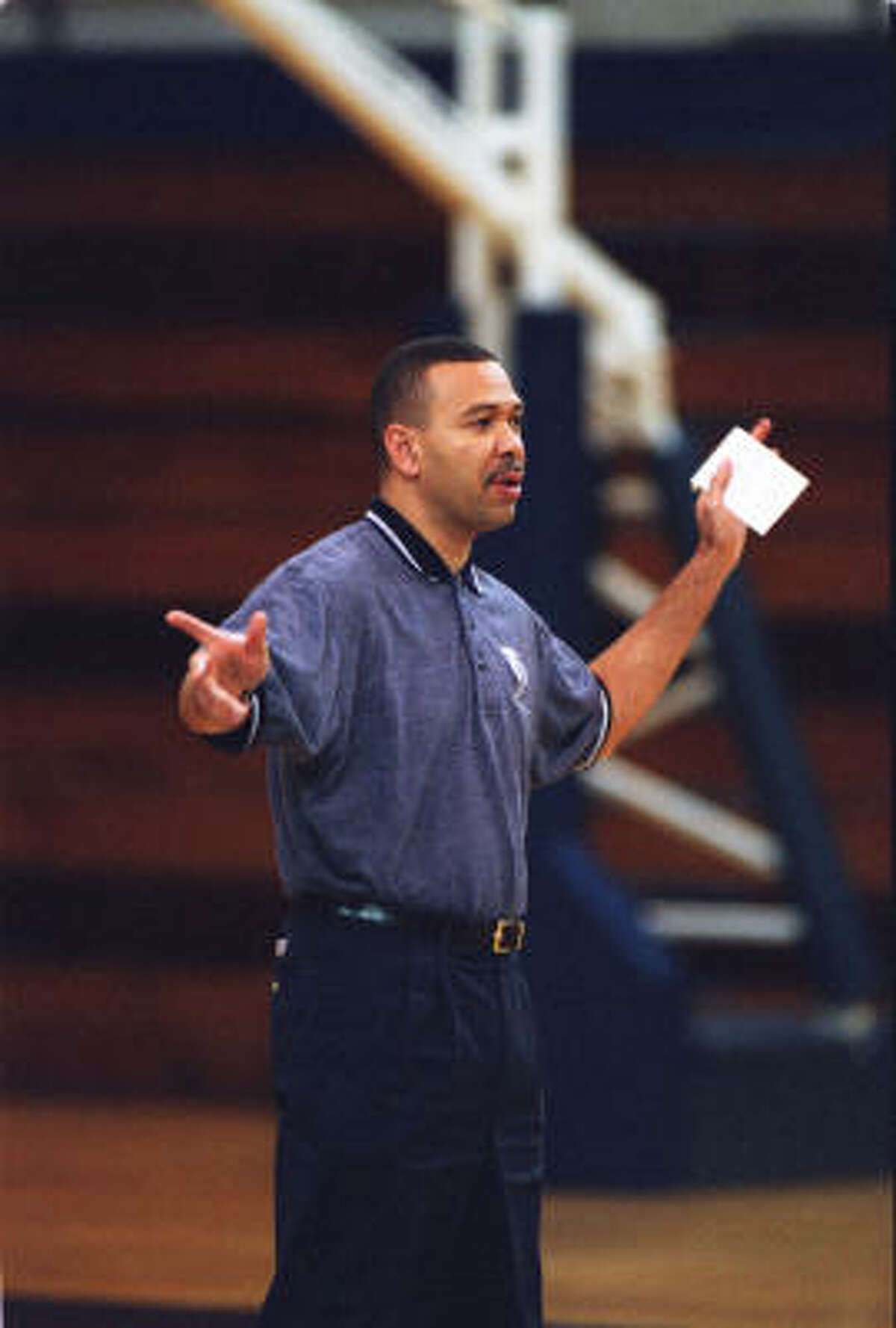 Willis Wilson (shown in 1999) had the longest tenure of any men's basketball coach at Rice.