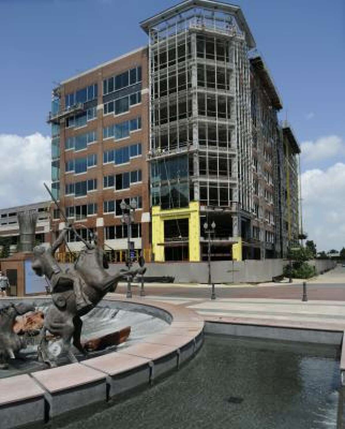 The Minute Maid building, under construction, is the newest structure at Sugar Land's Town Square Center. Fort Bend leads the nation in employment growth.