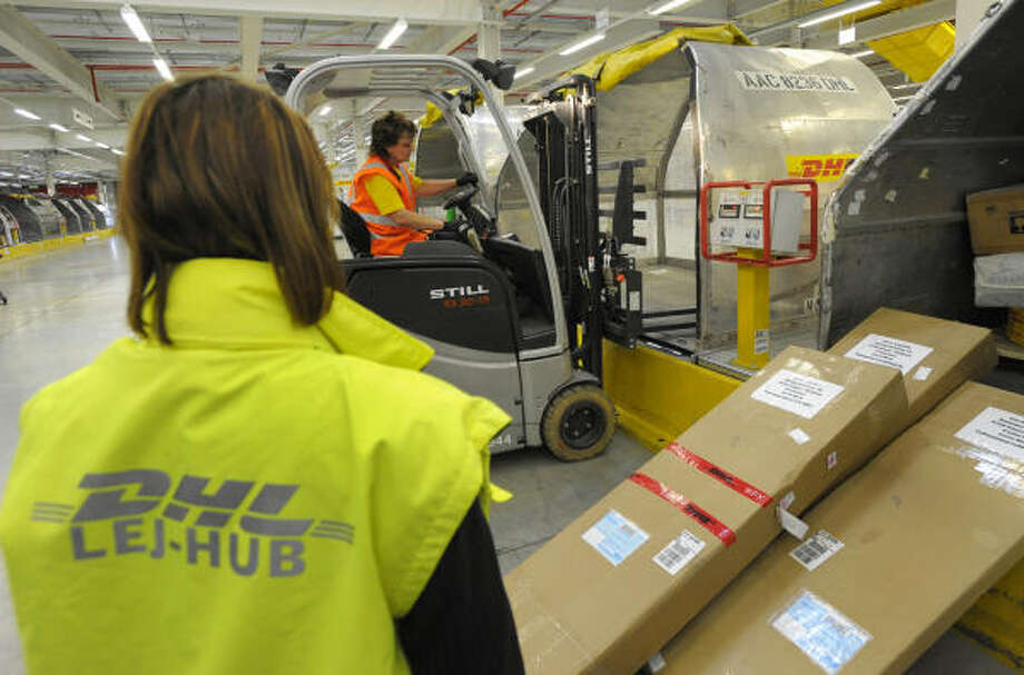 DHL to eliminate 9,500 jobs at U.S. unit Houston Chronicle