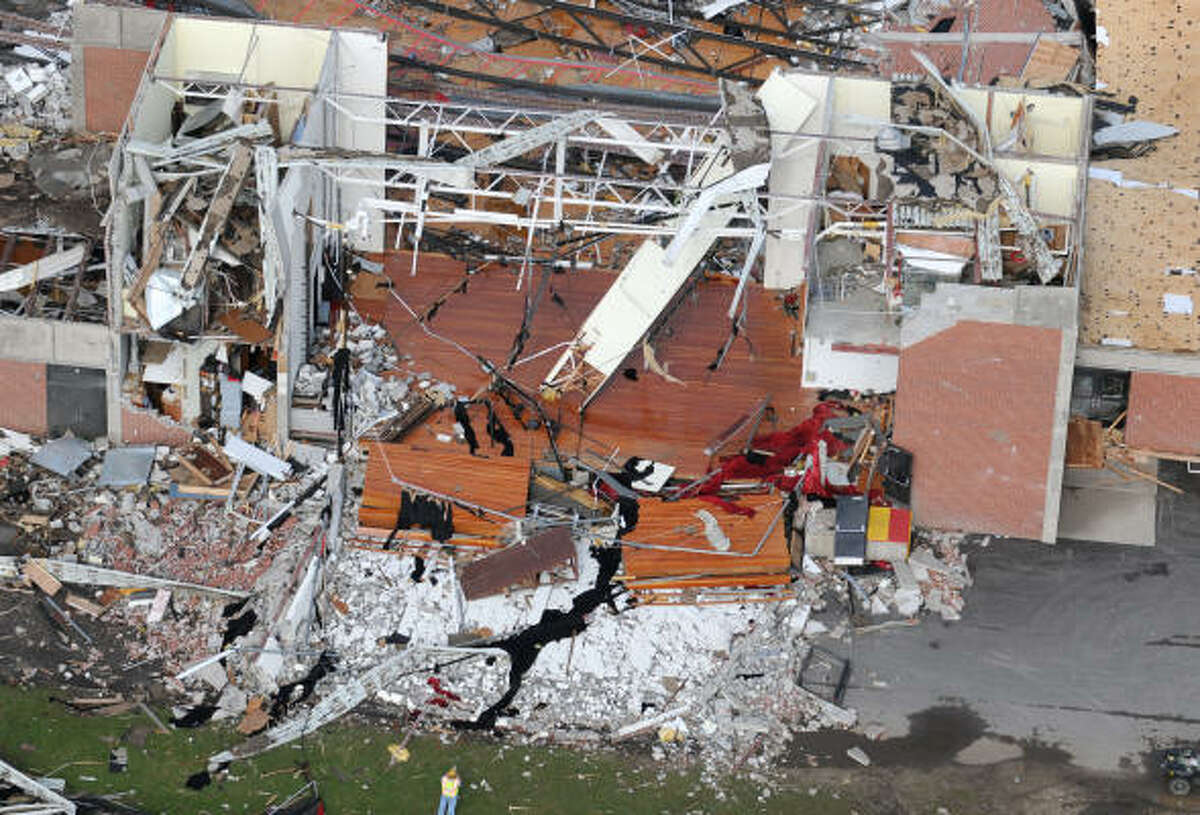 Iowa governor 'overwhelmed' by deadly storm's damage
