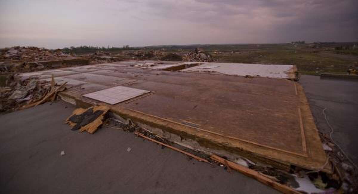Iowa governor 'overwhelmed' by deadly storm's damage