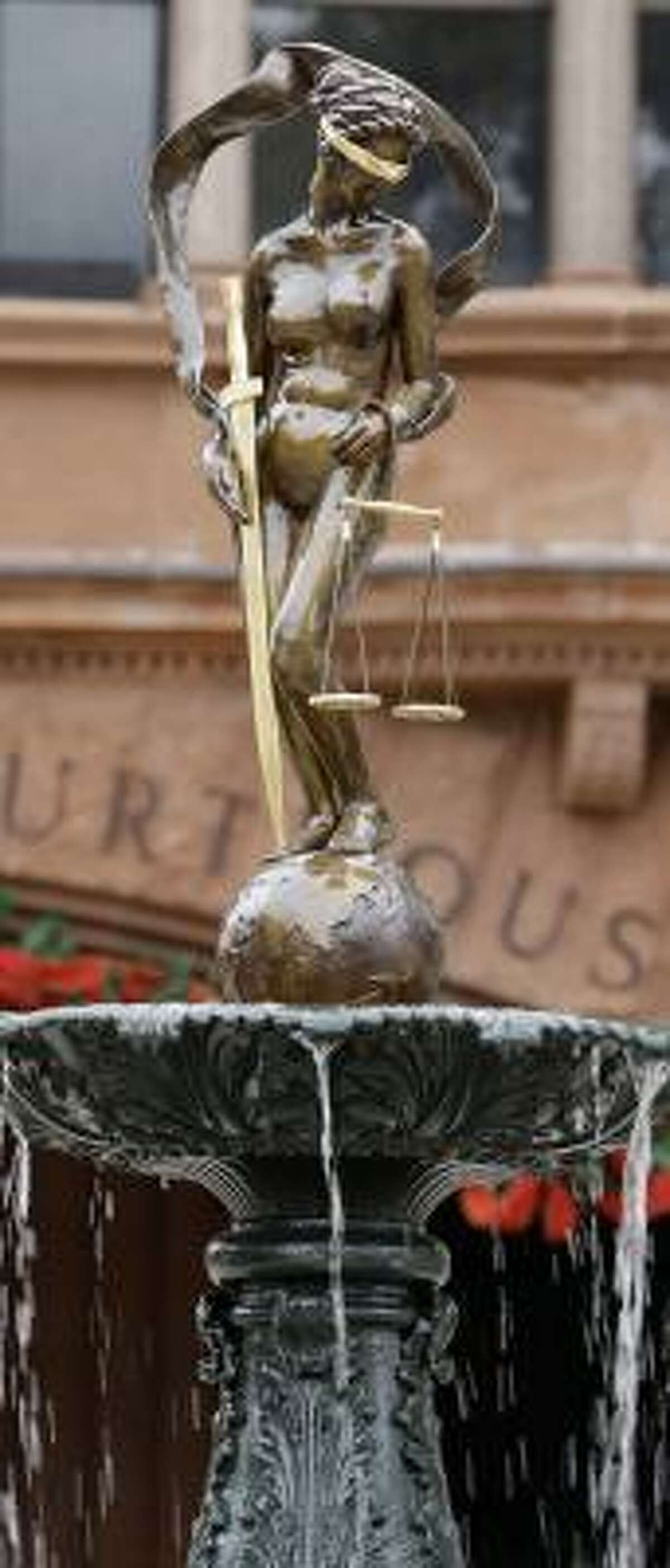 The Lady Justice statue and fountain have been restored at the Bexar County courthouse in San Antonio.
