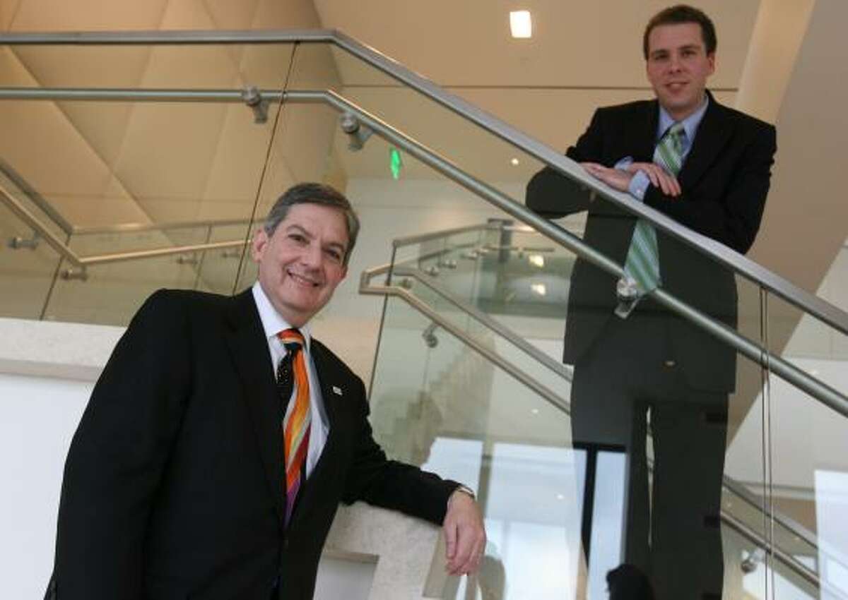The work of Larry Finder, left, and Assistant U.S. Attorney Ryan McConnell has been cited as critics look at how the Justice Department is dealing with companies accused of wrongdoing.