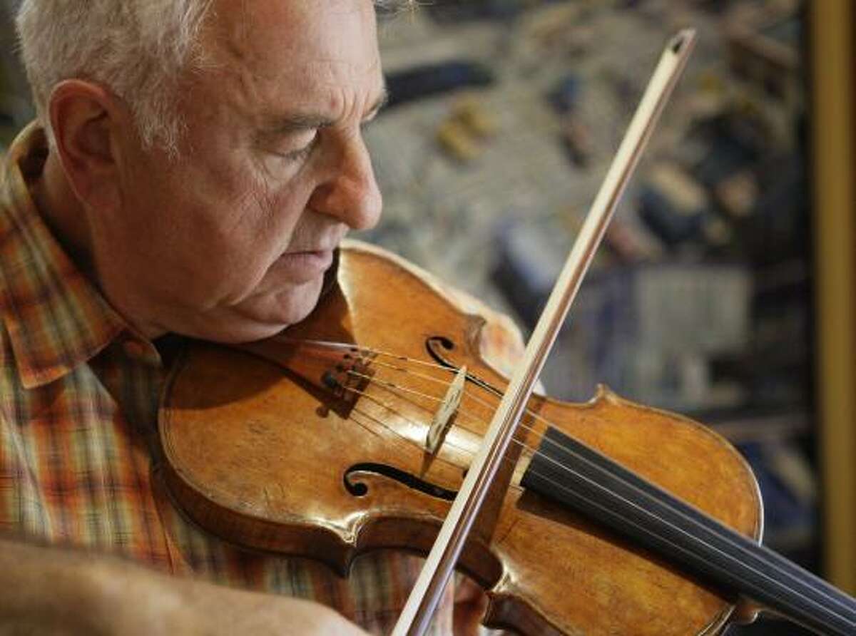 Violinist Sergiu Luca has played the violin for decades and has performed and taught in Houston and around the world.