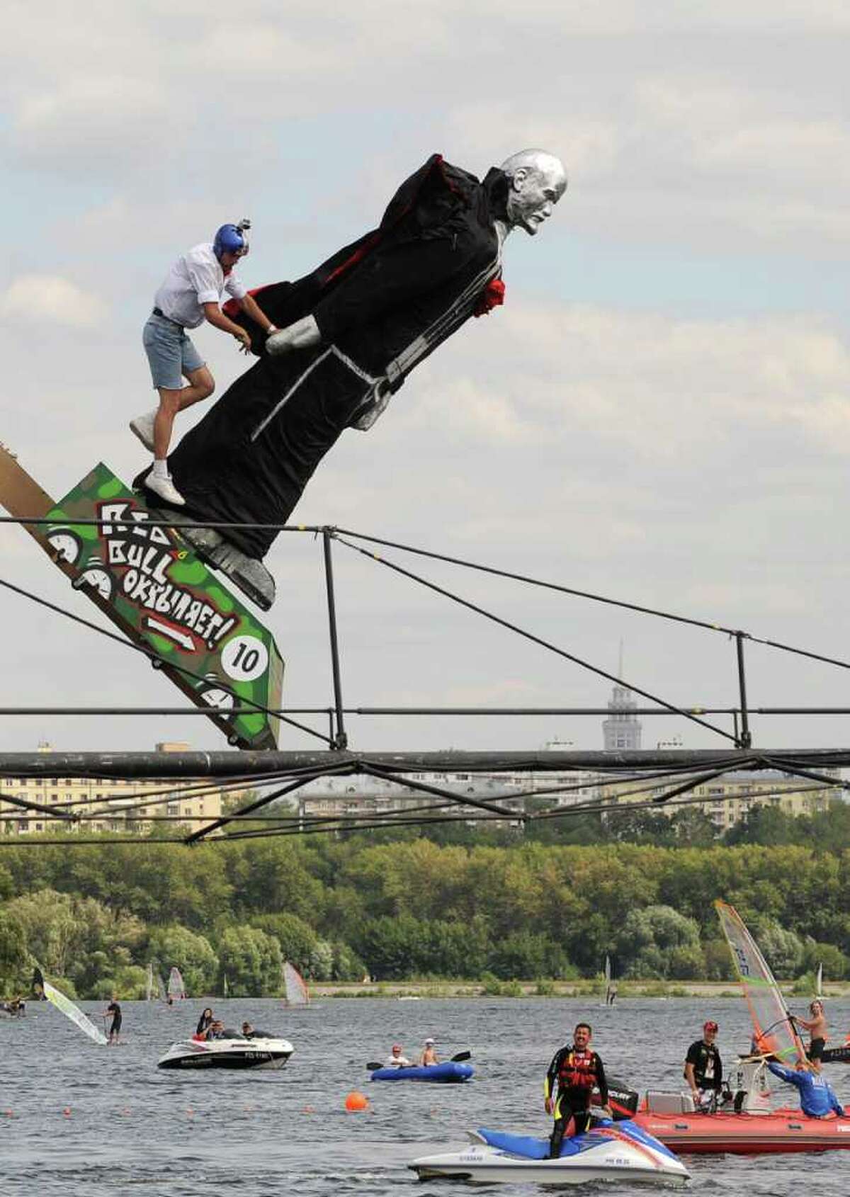 Moscow just hosted the latest Red Bull "Flugtag" ("flying day," in German) competition, in which teams send human-powered flying machines off a 30-foot-high deck. Teams get points for distance and style, although most seem to concentrate on the latter. Here, the "Ilich Square" team (Ilich was Lenin's middle name) competes in Moscow on August 7, 2011.