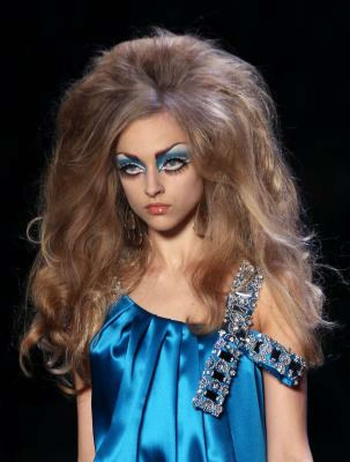 British designer John Galliano for Dior featured bouffant hairstyles in his fall show in Paris.