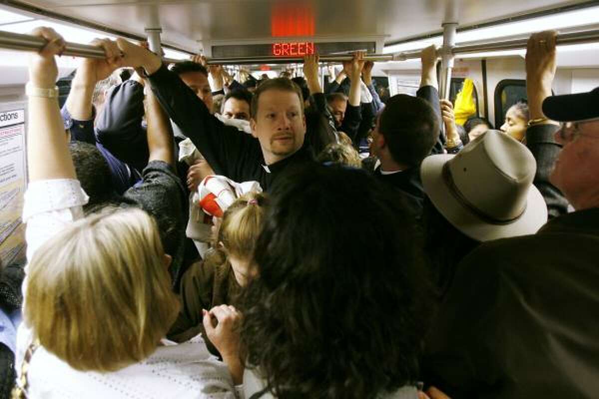 Riders pack a Metro train in Washington, D.C., in April. Even now, more people are using public transit.