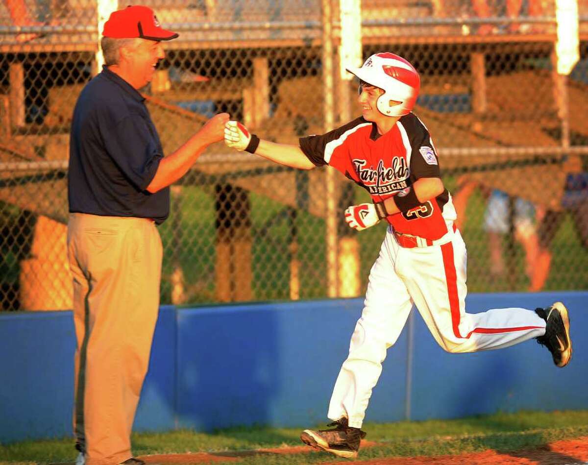 Fairfield American's Jack Oricoli rounds third base after smacking a solo home run in the third inning of their win over Yarmouth, Maine at the Little League Eastern Regional in Bristol on Monday, August 8, 2011.