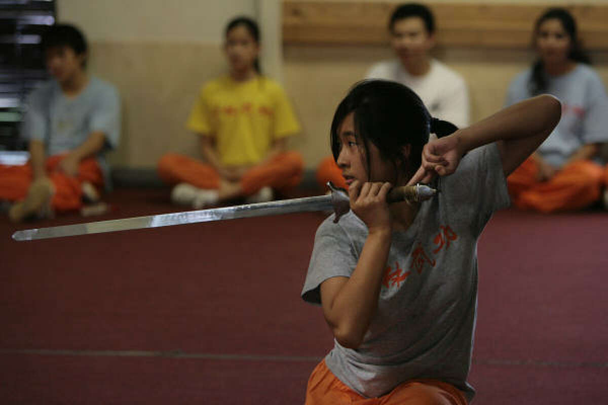 Melanie Kwok completes a straight-sword routine.