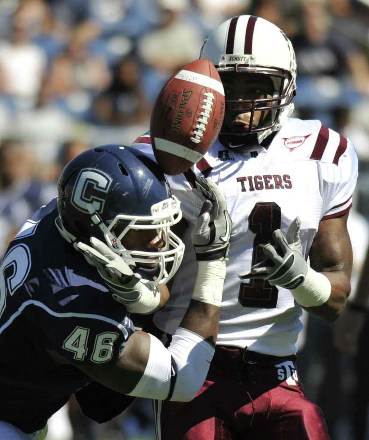 Connecticut's Sio Moore (46) attempts to grab a pass intended for Texas Southern's Joe Anderson, right, during a win last September.