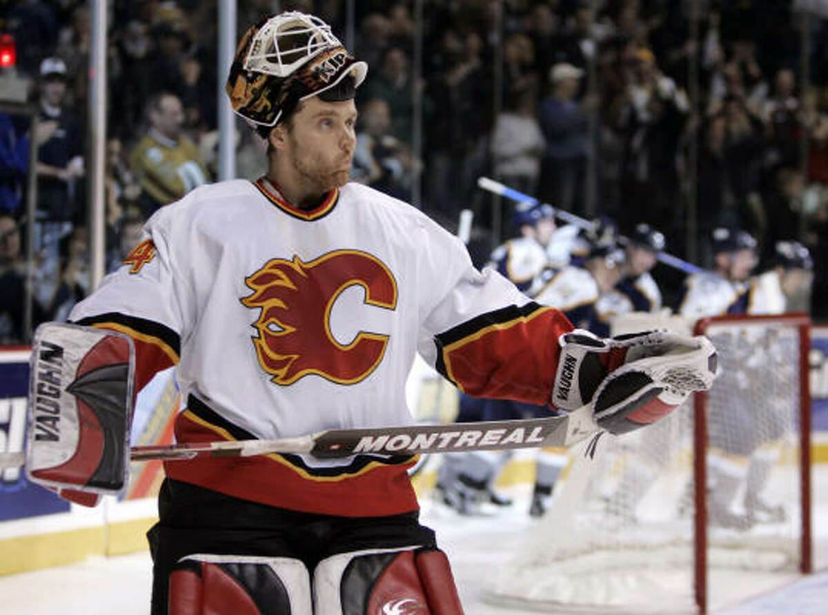 Miikka Kiprusoff (34) and Calgary lost for the eighth straight time in the series with Nashville.