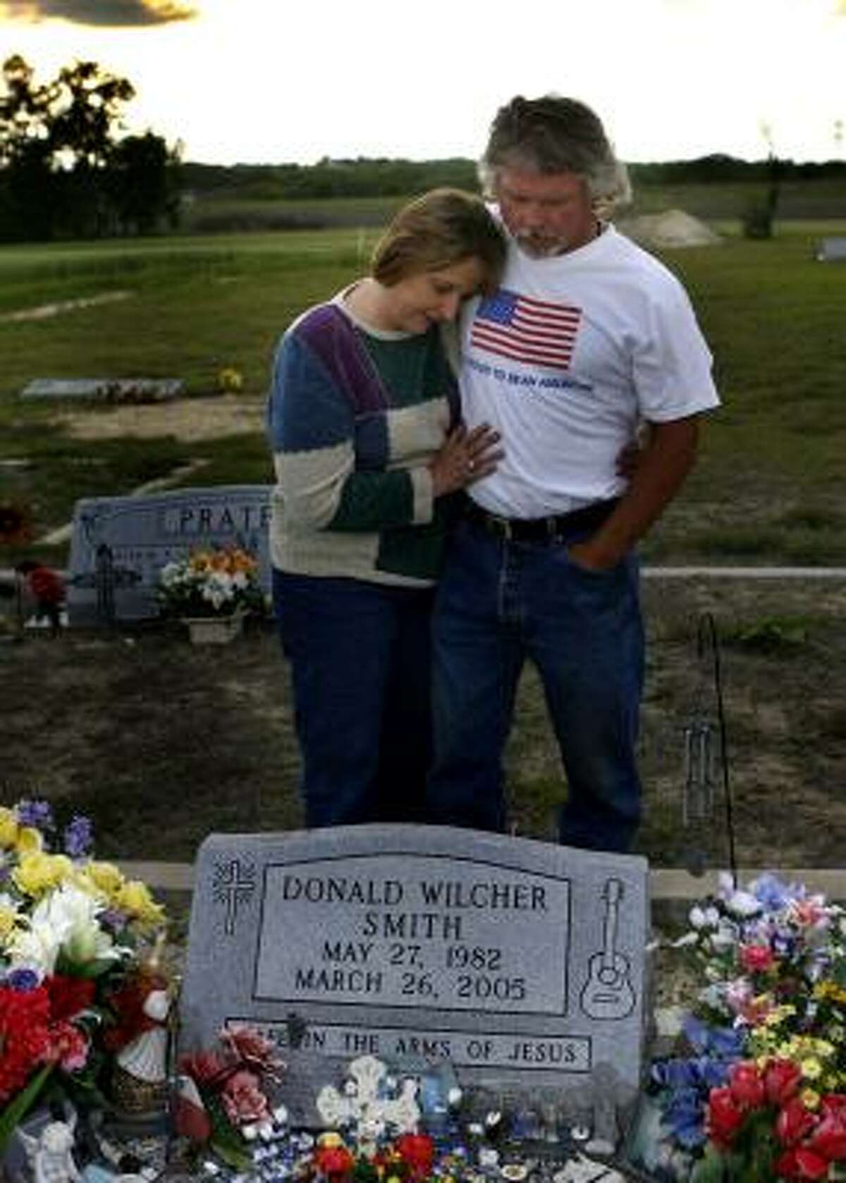 Tricia and Coit Smith visit their son's grave outside Temple every day. Their son, Donald W. Smith, died in a work accident at a chicken plant in Bryan in March 2005.
