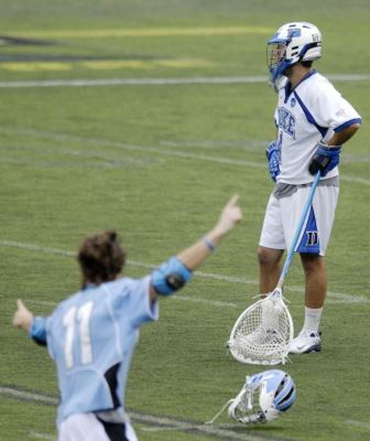 Johns Hopkins spoiled Duke's happy ending, beating the Blue Devils 12-11 to capture the NCAA men's lacrosse championship.