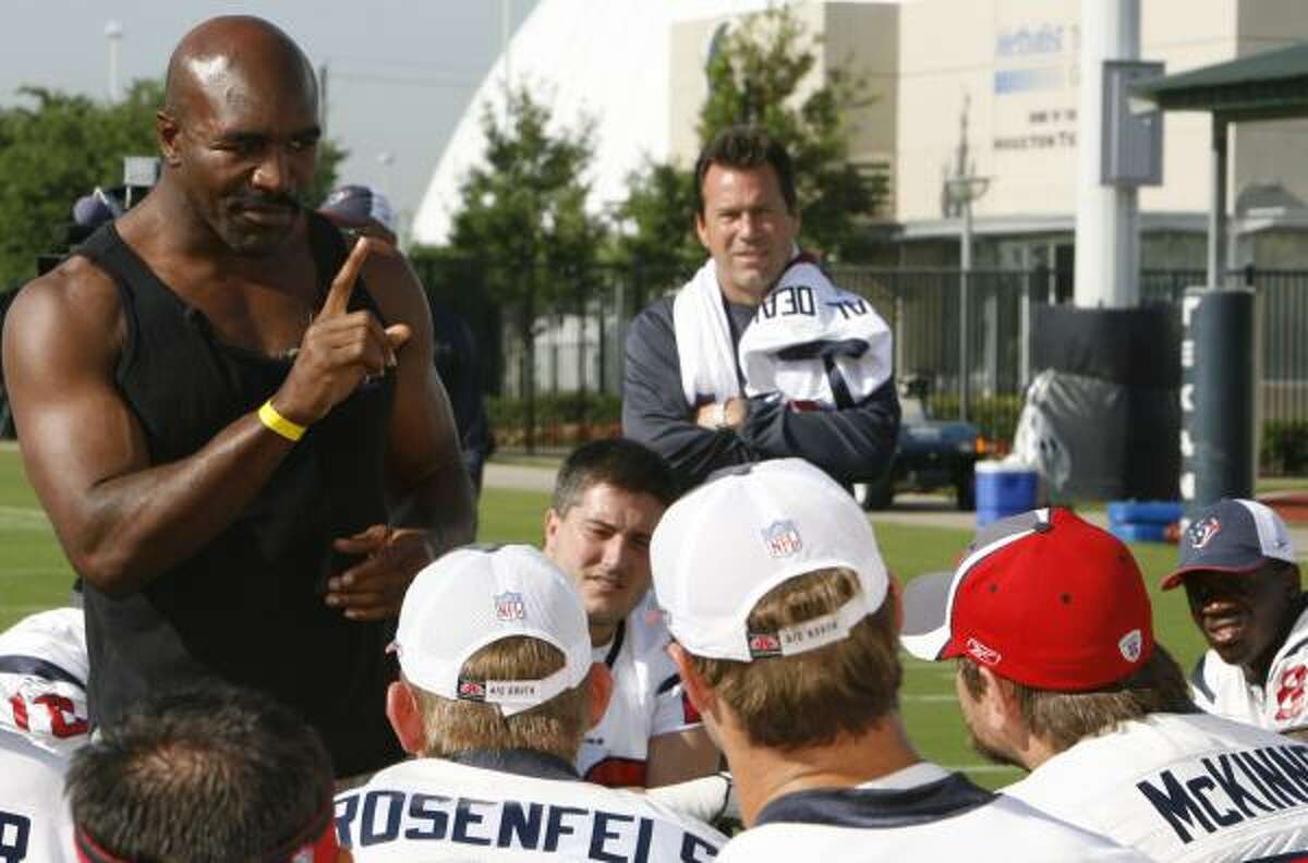 The Texans got a pep talk Thursday from former heavyweight champ Evander Holyfield, who took a break from training to visit the team.