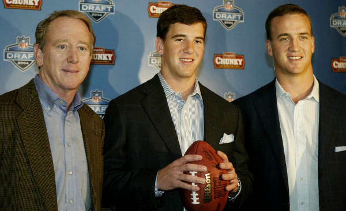 Archie Manning will have only youngest son Eli (center) to watch in the NFL now that older brother Peyton (right) has retired.