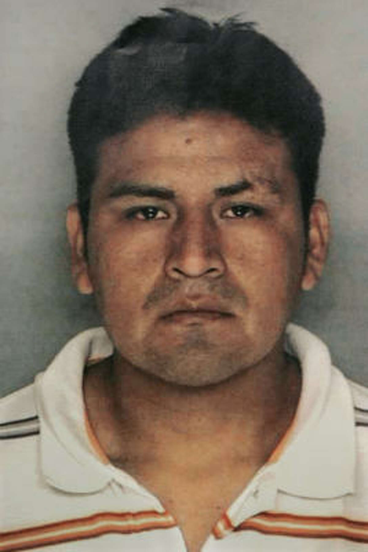A police photo released Thursday shows Jose Carranza, 28, who was charged with three counts of first-degree murder and one count of attempted murder.