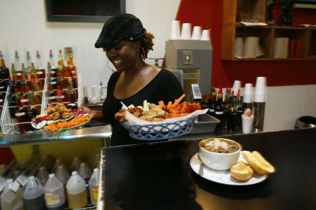 Lakesha Reed, 29, who has a marketing degree from the University of Houston, opened Beaucoup Wings and Wings near the school last year. But Reed intends to return to New Orleans eventually. ``Houston's cool; it's OK. But it's not the same feel that you get at home,'' she said.