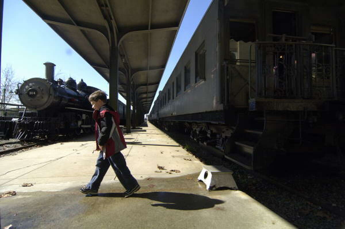 John Riordan, 8, of New Jersey, visits the railroad museum in Galveston, where the city is working on a blueprint for passenger service to Houston. Passengers from Houston would disembark at the museum, where they could catch a bus or trolley.